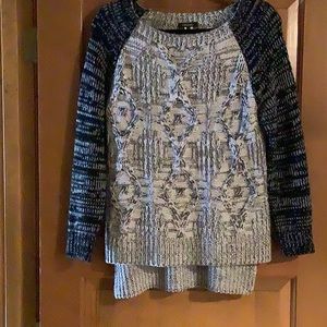 Kerisma Black & White long sleeved high low sweater size medium EUC.